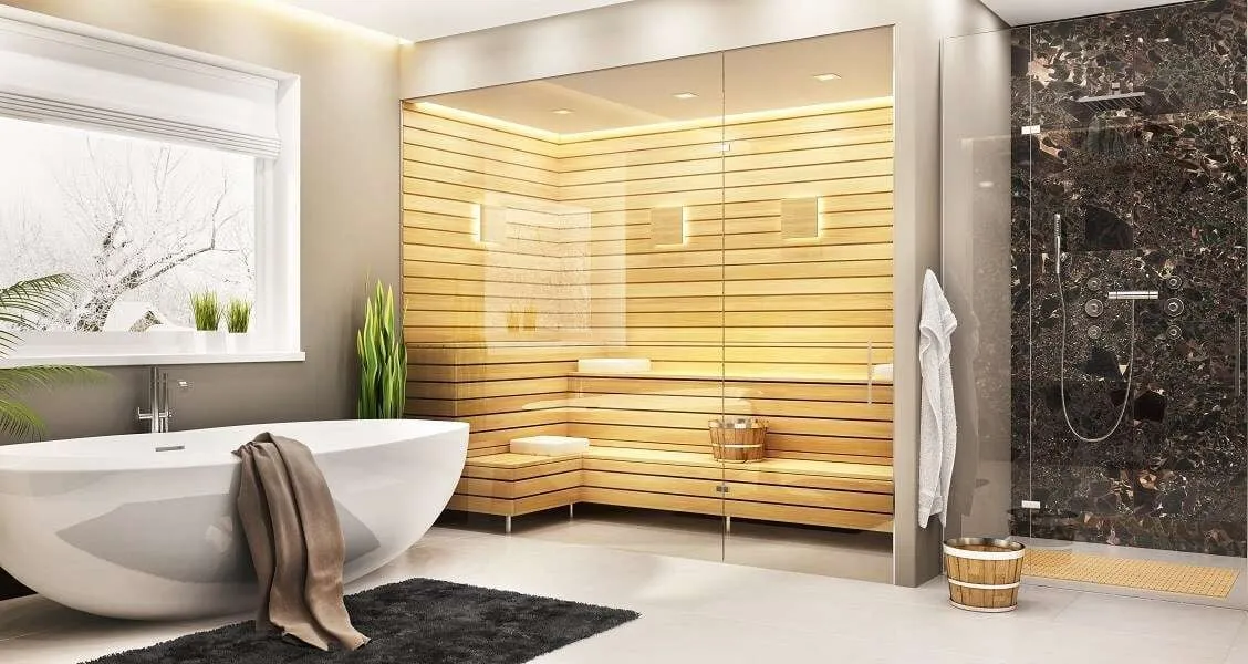 Eine eigene finnische Sauna ist in einem luxuriösen Bad im Eigenheim integriert