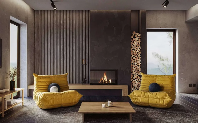 Ein stylisches Wohnzimmer mit dunklen Wänden und Möbeln aus Holz als Sinnbild dafür, wie eine Wandgestaltung den Raum verändern kann.